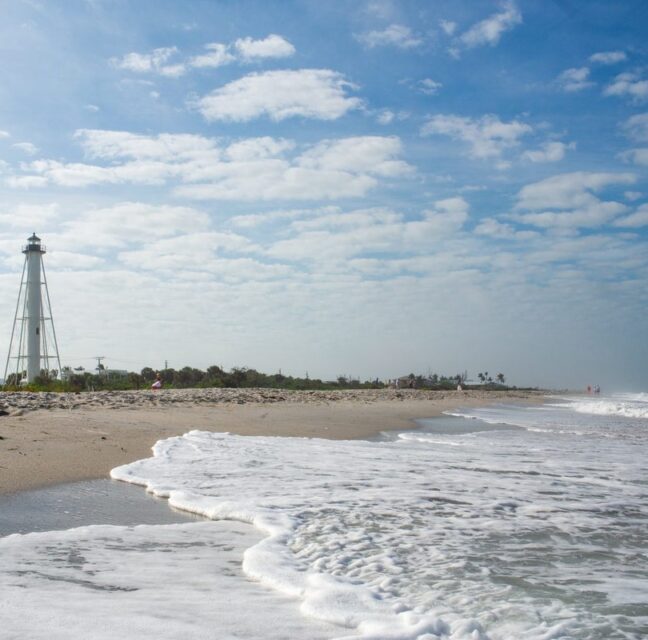 Boca Grande Beach shoreline with the lighthouse in the distance
