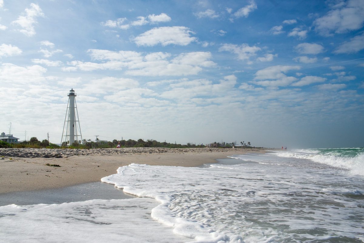 Boca Grande Beach shoreline with the lighthouse in the distance