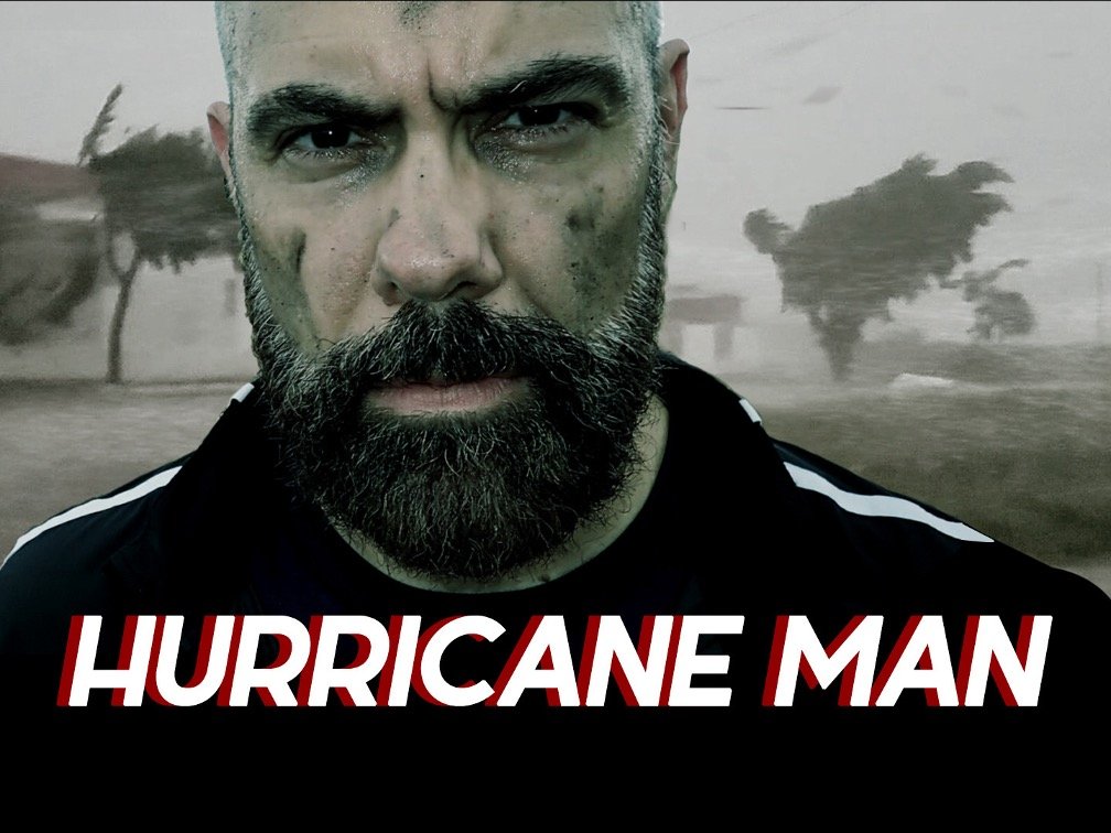 Hurricane chaser Josh Morgerman in front of a storm, from Hurricane Man
