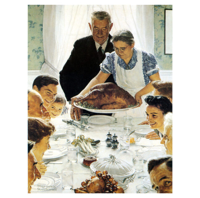 Family gathered at a table as a roast turkey is set down