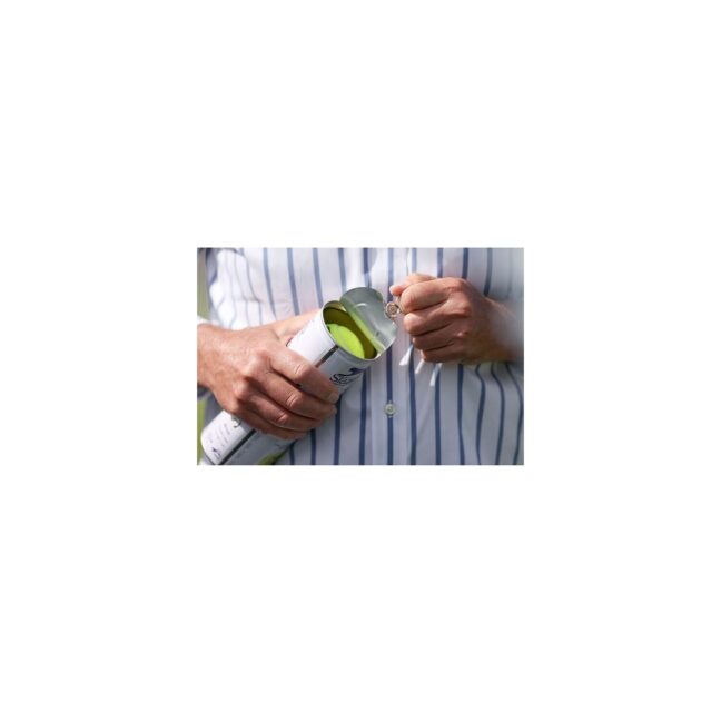 Hands opening a sealed can of tennis balls